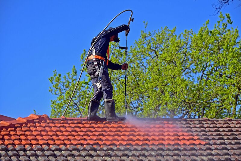 High-pressure roof cleaning by Empire Roofing