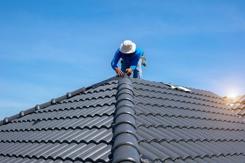 Tile roof restoration work by Empire Roofing